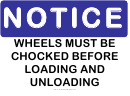 Notice Wheels Must Be Chocked Sign